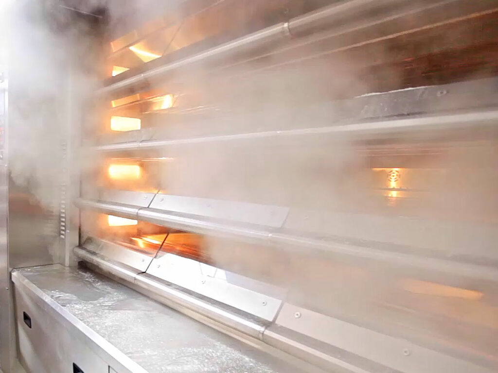 Steaming bread in bakery pipie oven