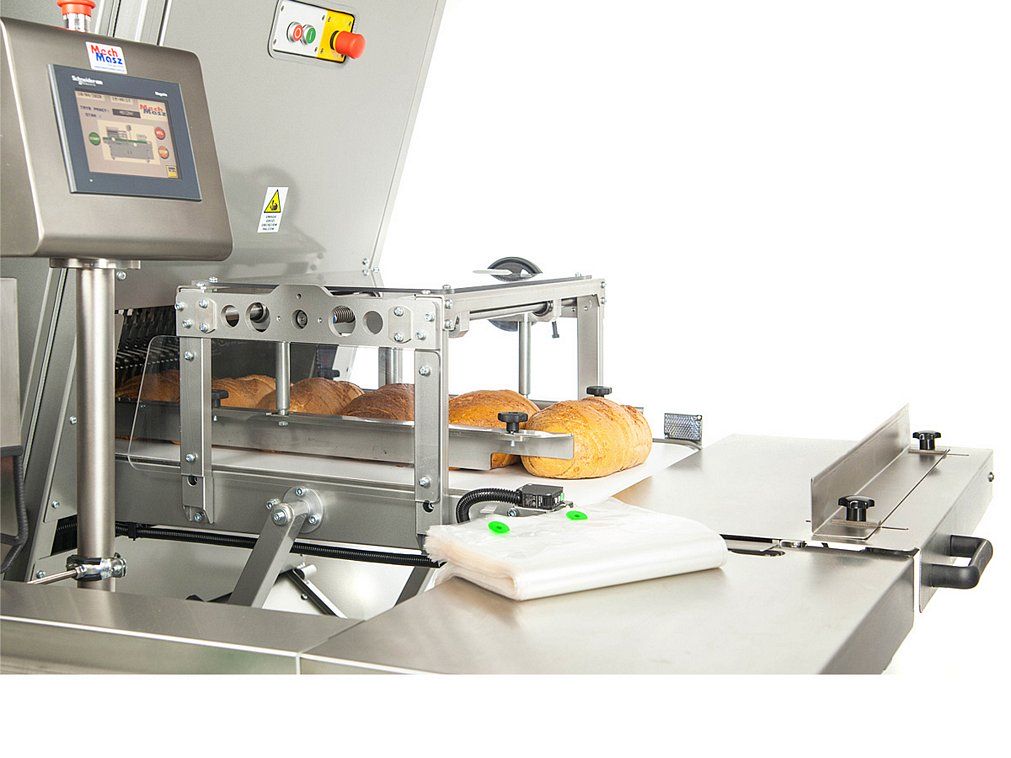 bread slicing and packaging line manual packing station – bag blows
