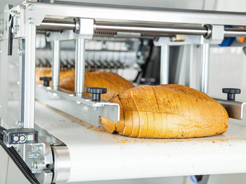 Bread slicing and packaging machines